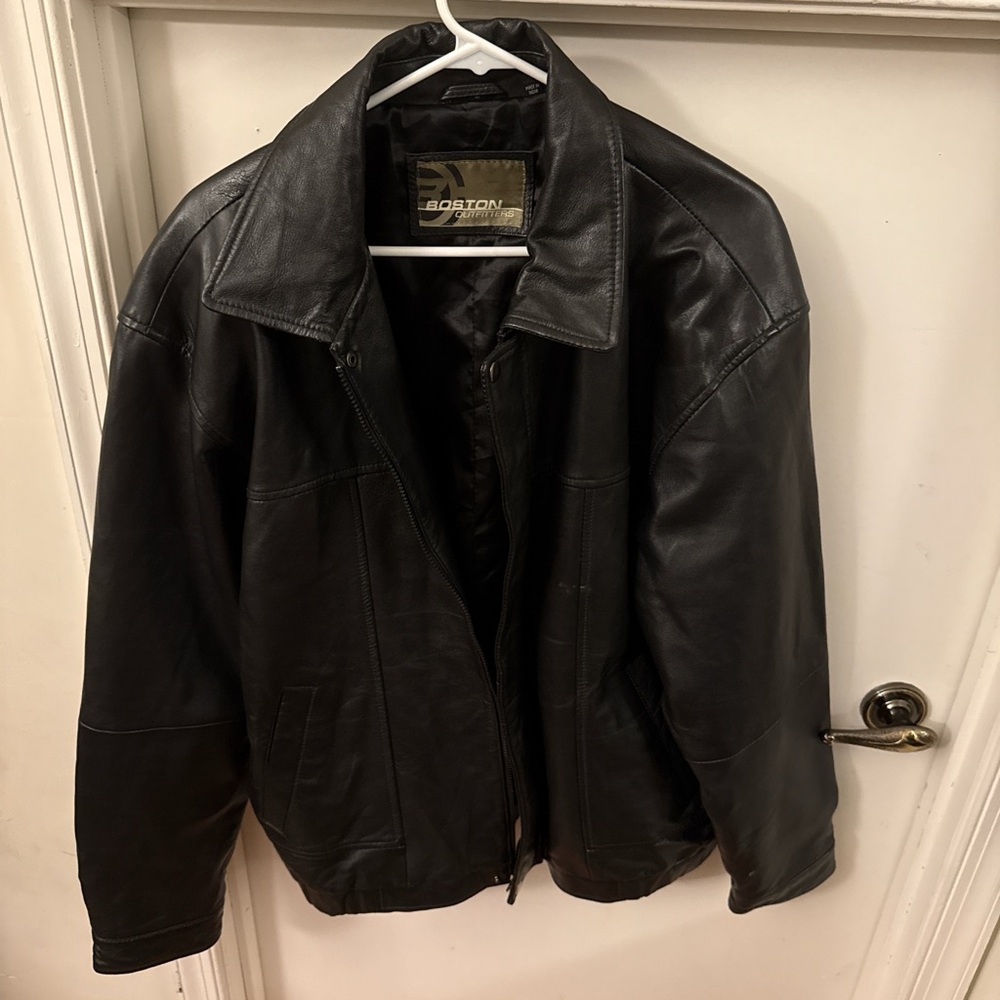 Black Bomber Jacket with Classic Style and Zipper Closure